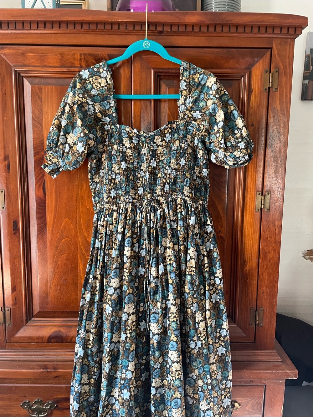 Doen Floral Smocked Midi Dress in Teal, Cream, and Black